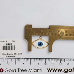 8642 Dije Dorado con Ojos Turcos y Esmalte Blanco