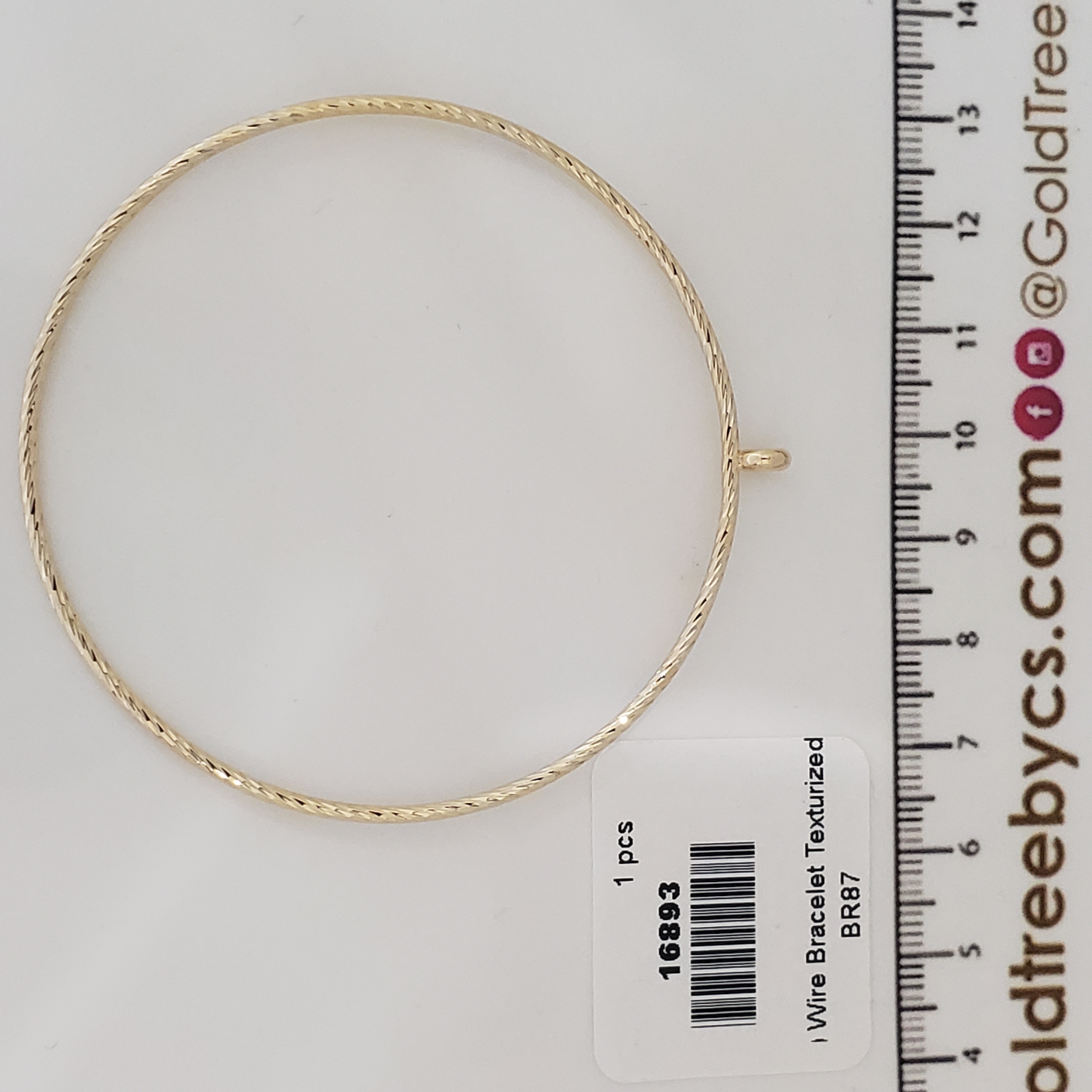 16893 Twisted Gleam Gold Bangle