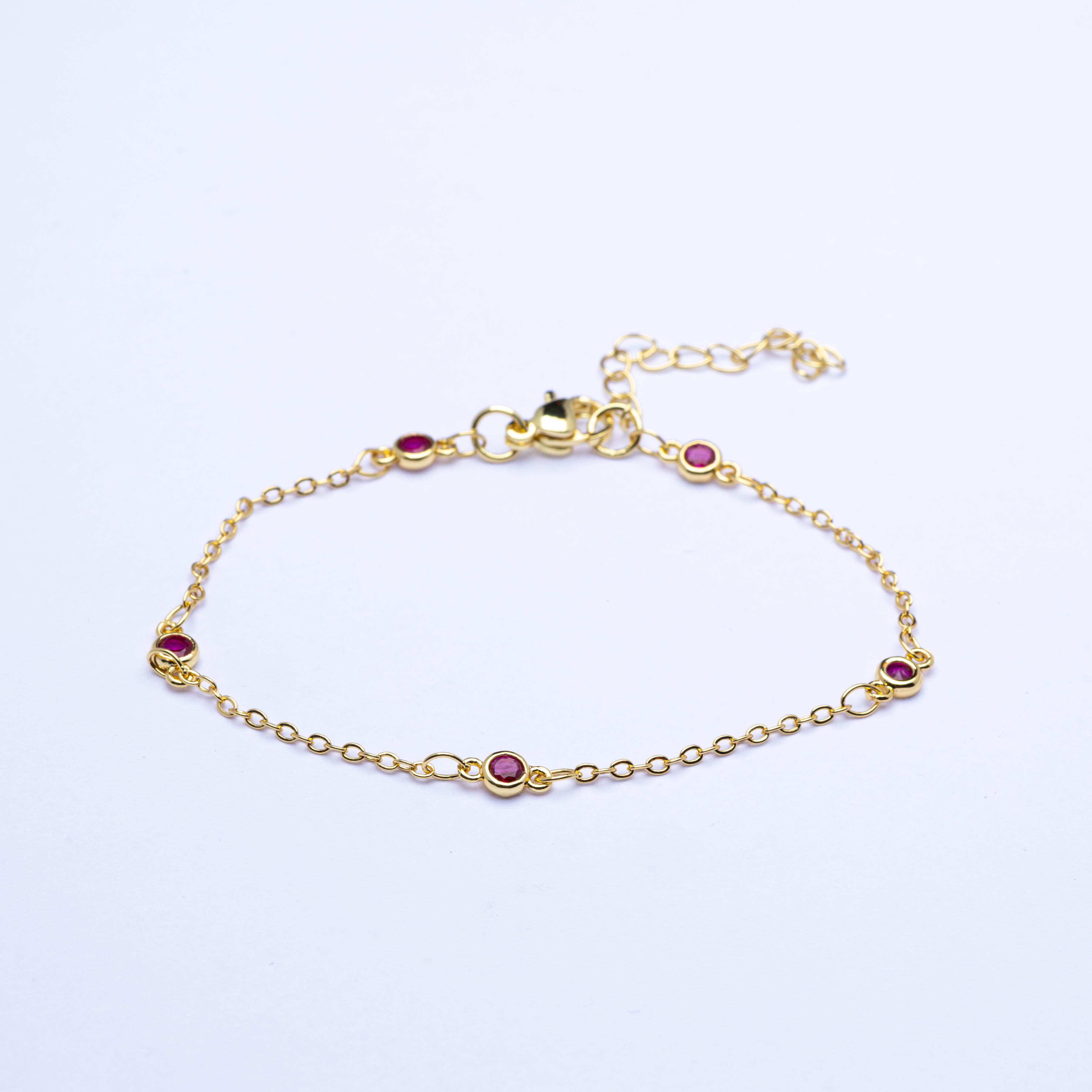20433 Gold Bracelets with Fuchsia Crystals