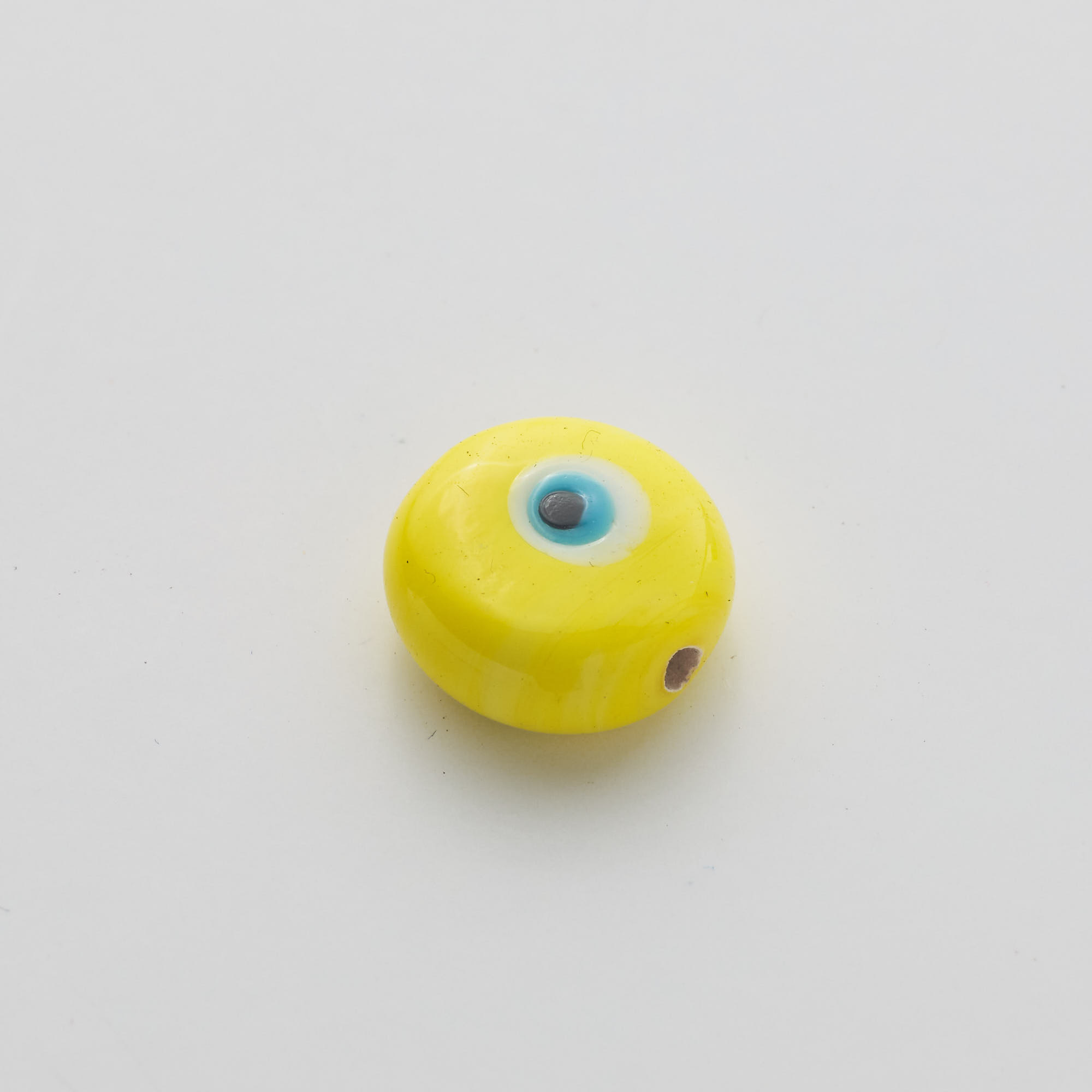 15745  Yellow Eye Round Amulet 14mm