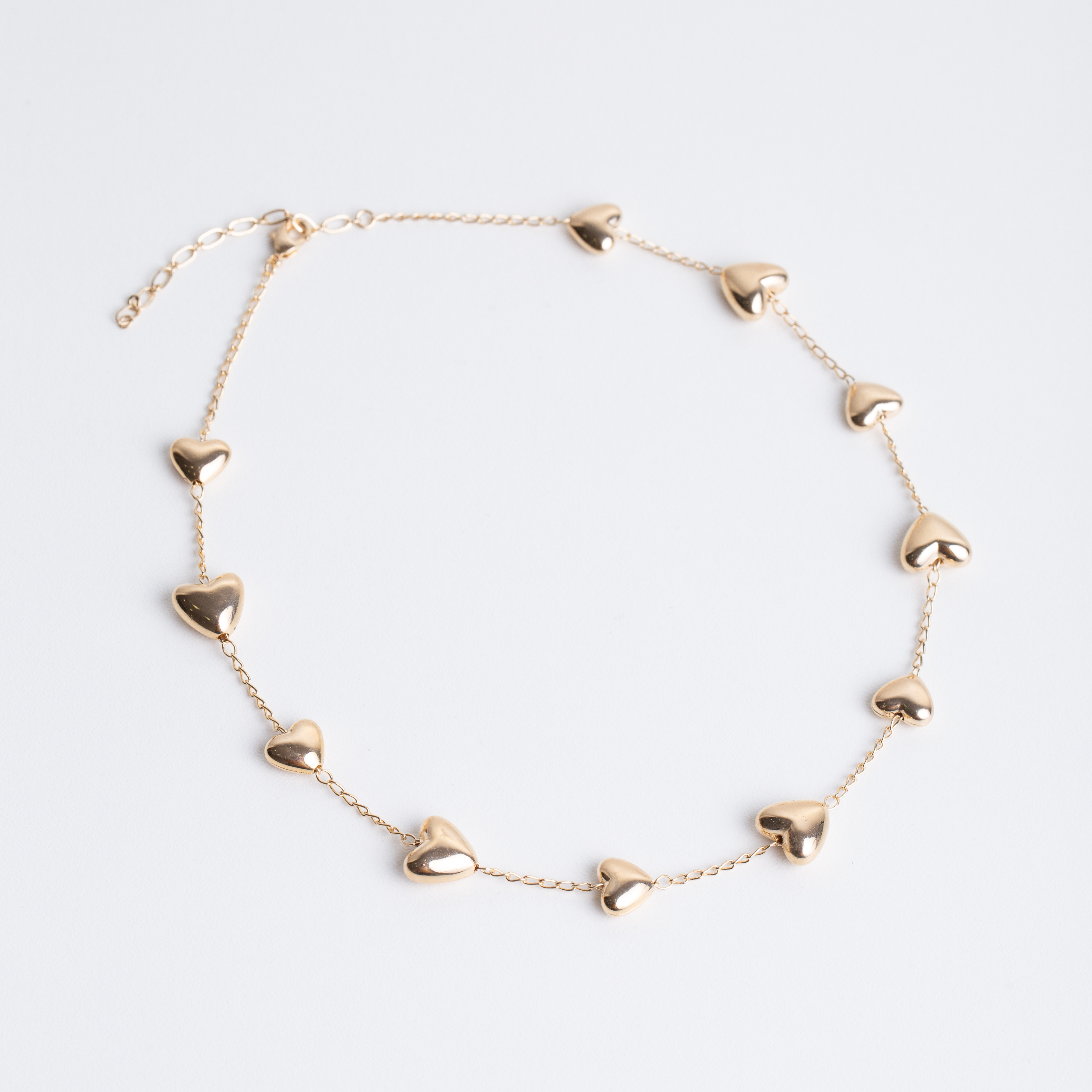 21057 Chain Dorado con Corazones Enlazados