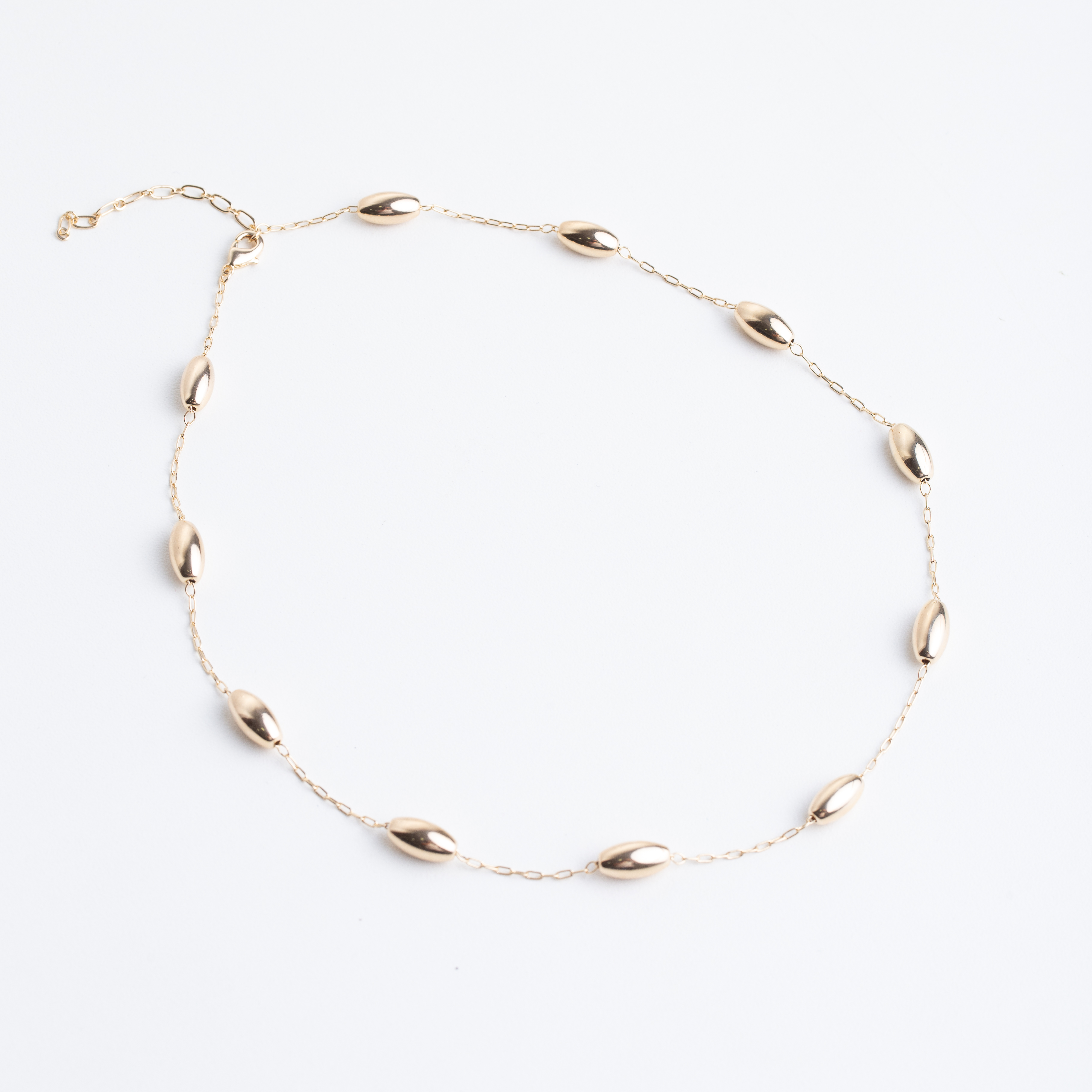20033 Gold Necklace with Oval Bead Details