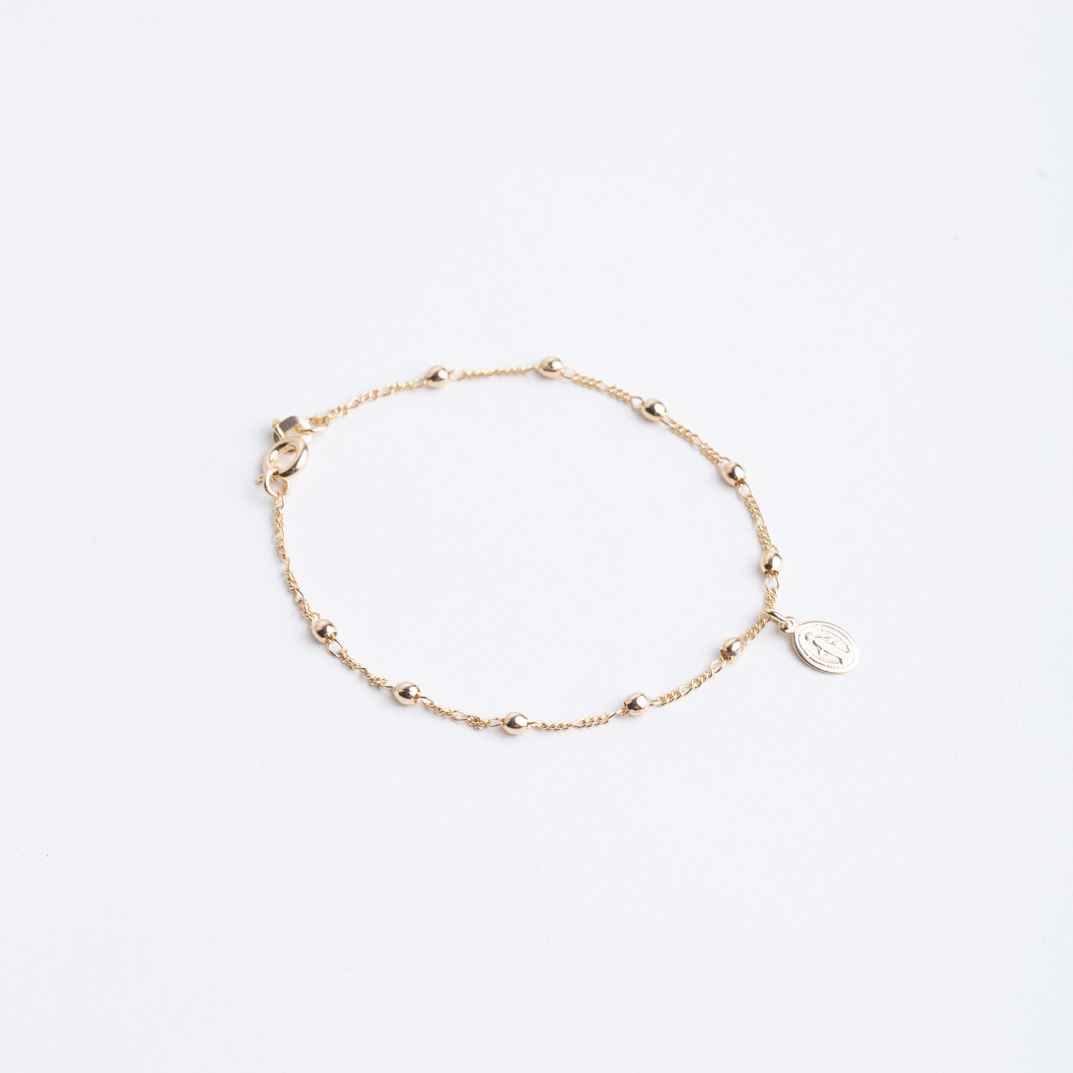 20035 Golden Beaded Bracelet with Virgin Medal