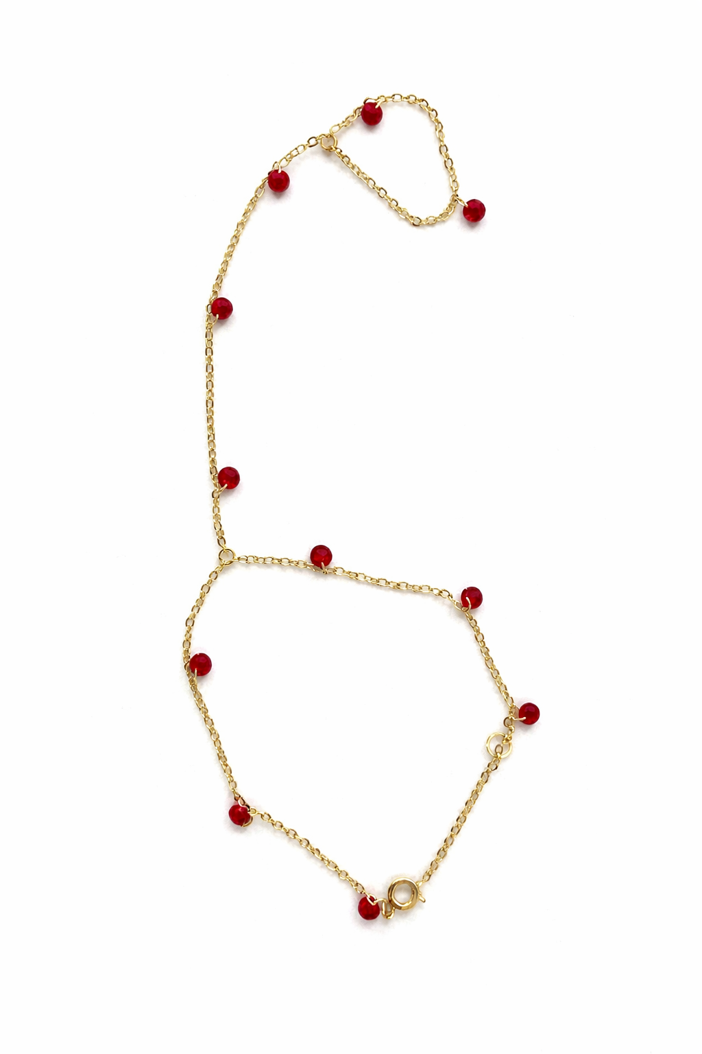 21580 Hand Chain Dorado con Cristales Rojos