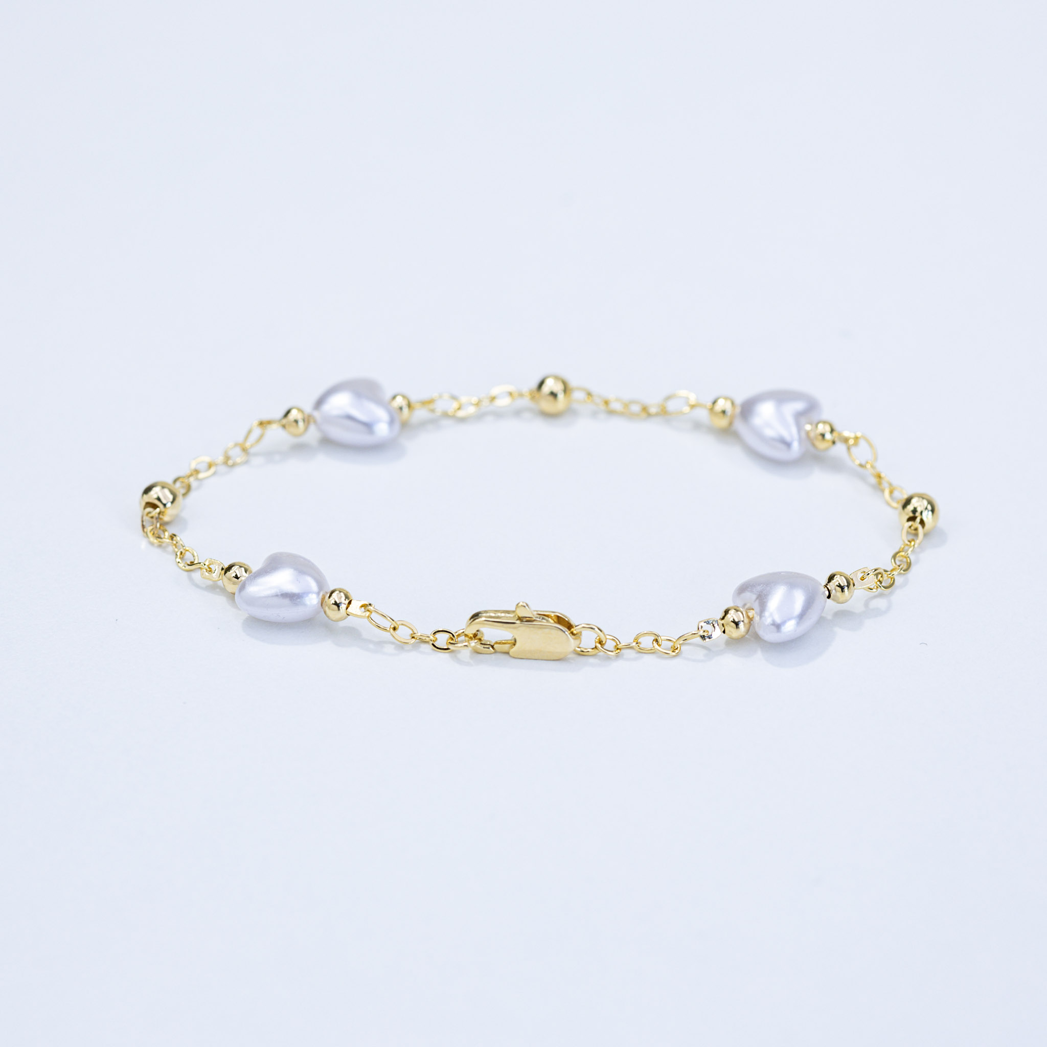 20104 Gold Bracelet with Heart Pearls 8mm