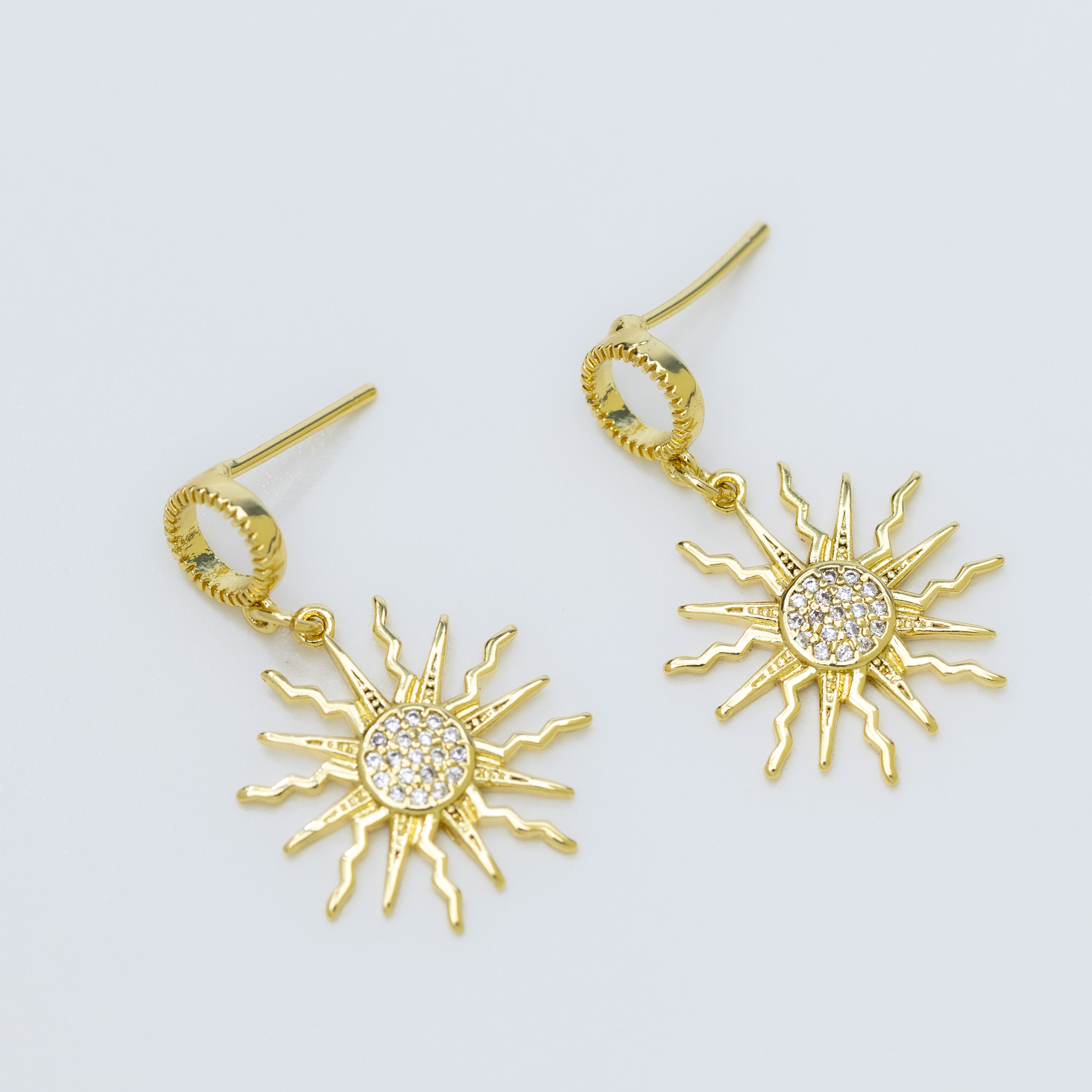 19877  Gold earrings with sun design and  crystals