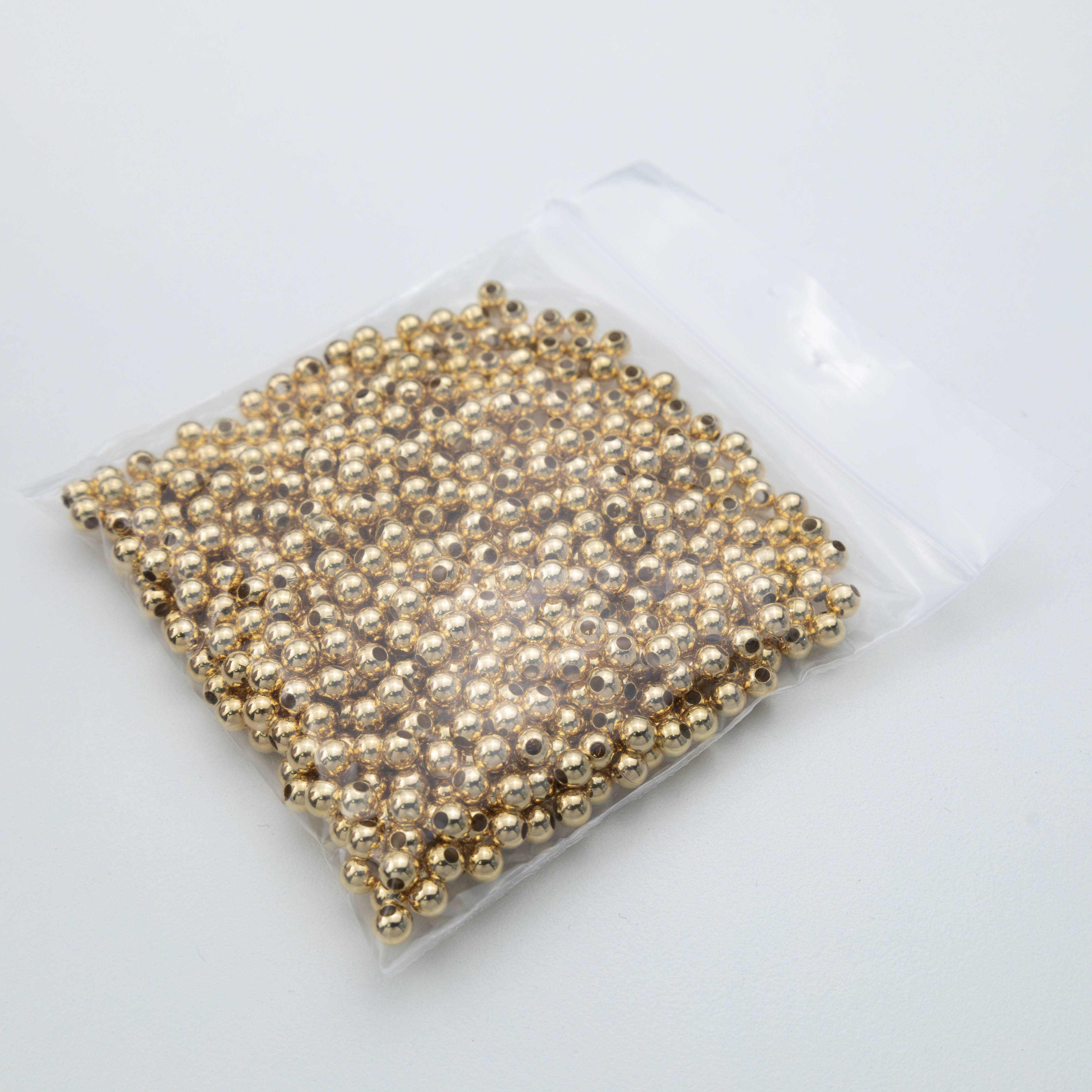 2721 4mm Medium Hole Smooth Round Beads