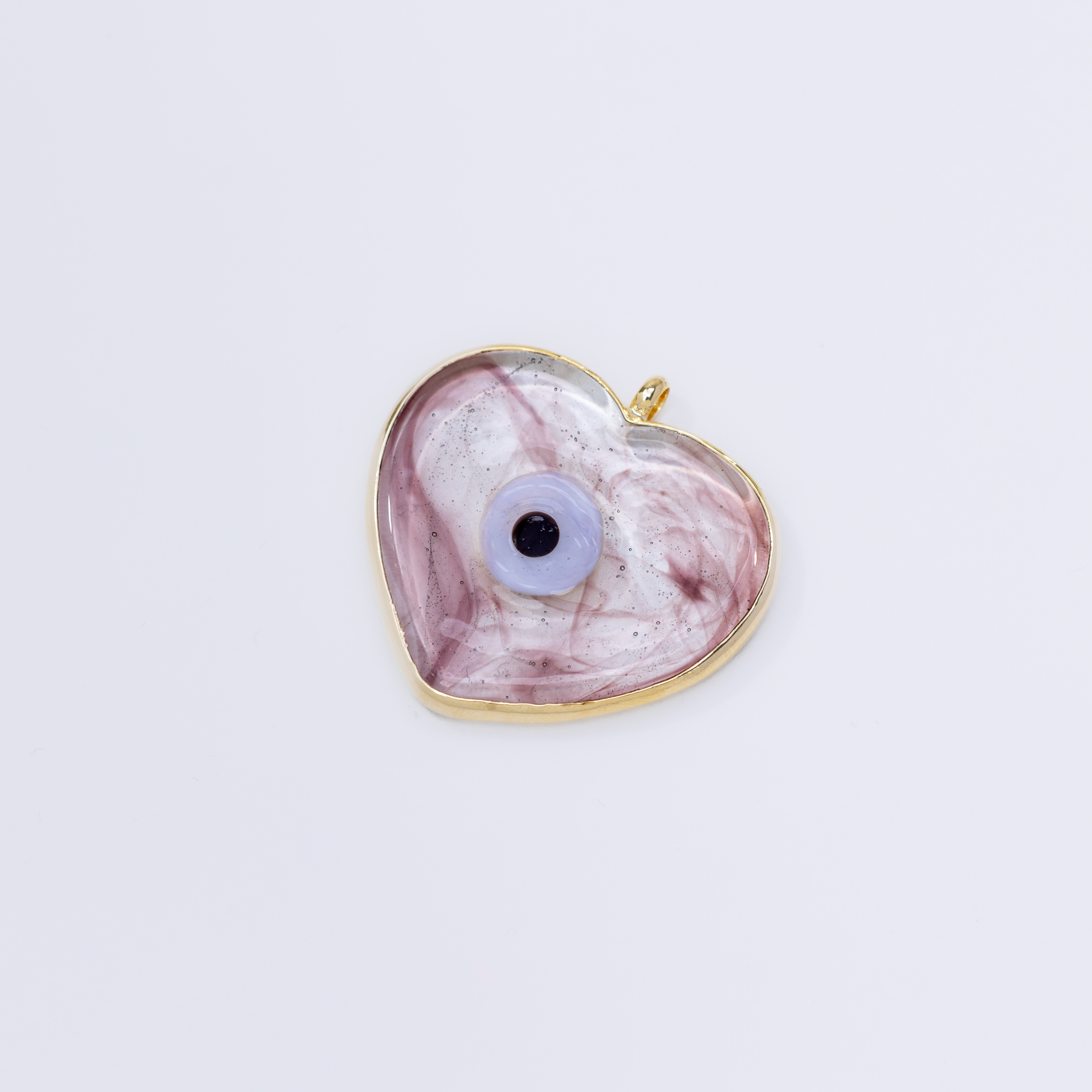 19973 Corazon con Ojo Bizel Transparente con Morado 40mm