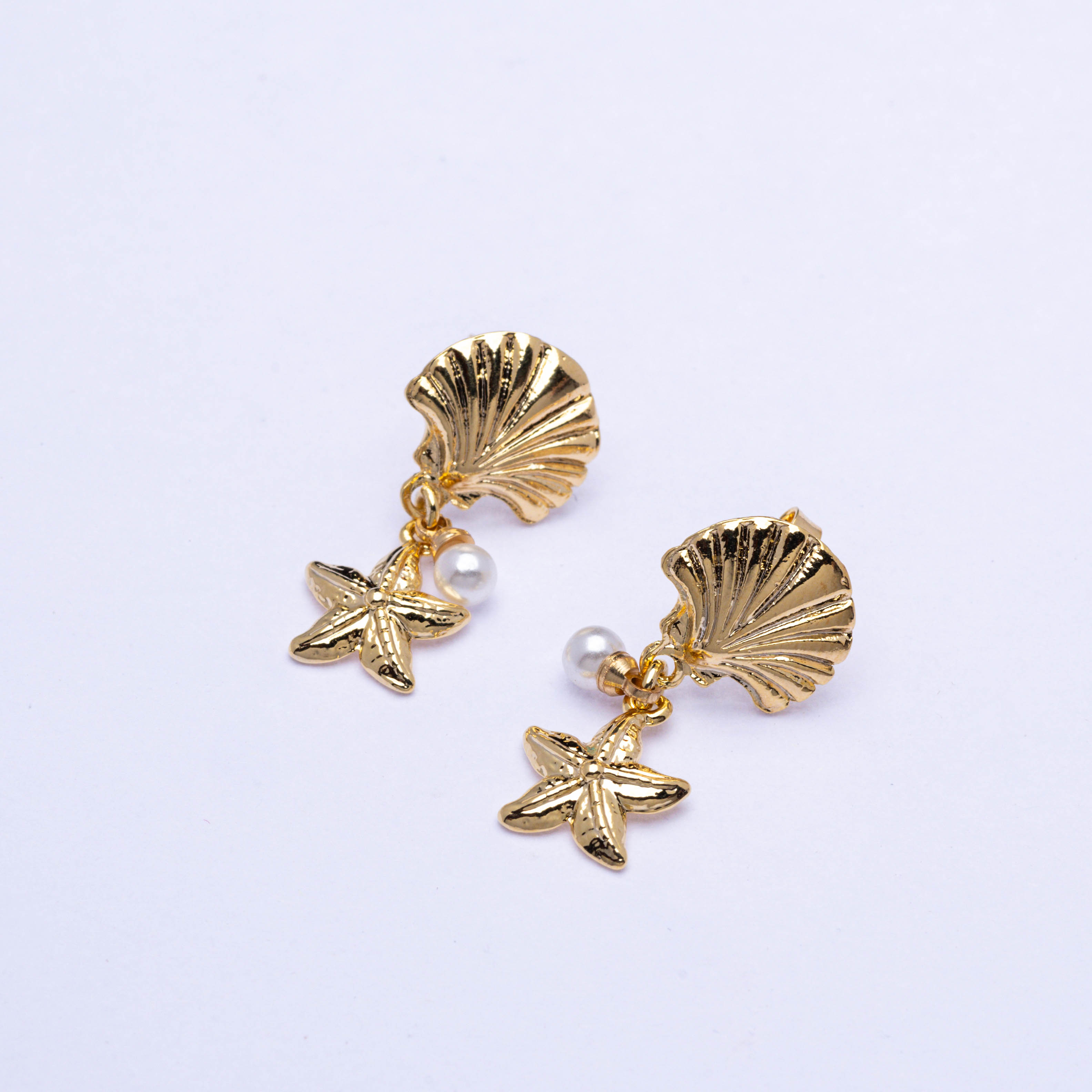 20888 Golden Oyster With pear And Star Earring