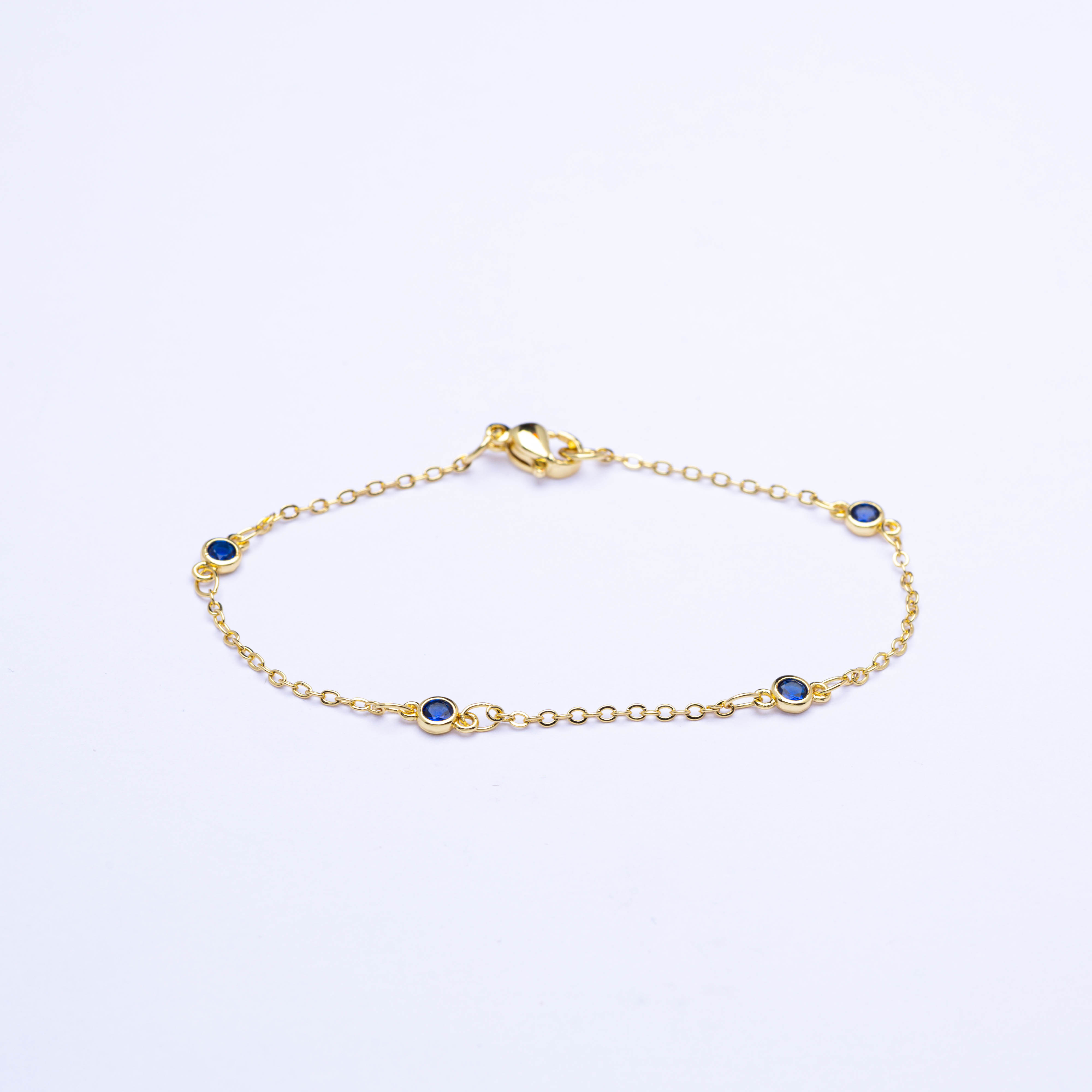 20432 Gold Bracelets with Navy Crystals