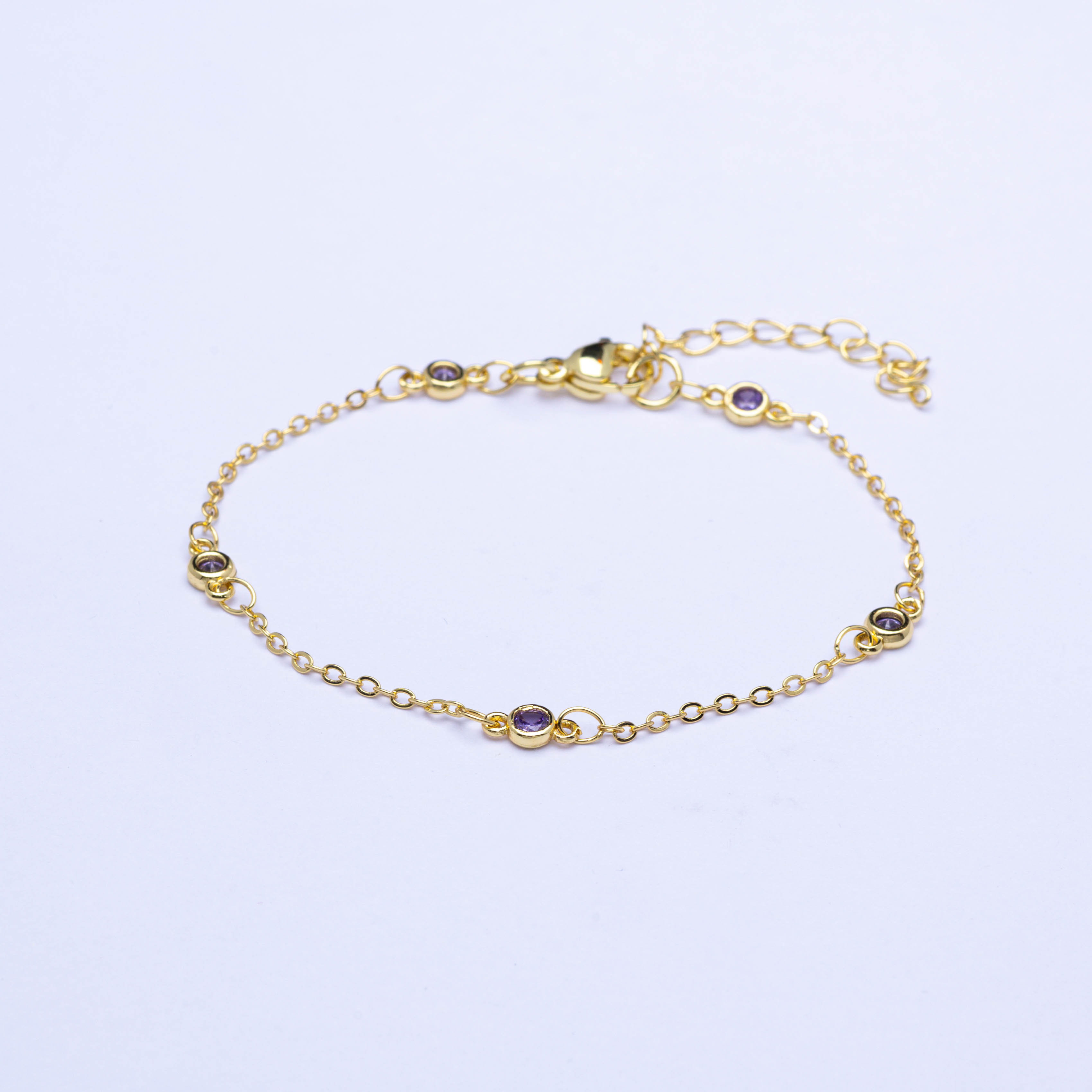 20435 Gold Bracelets with Lilac Crystals