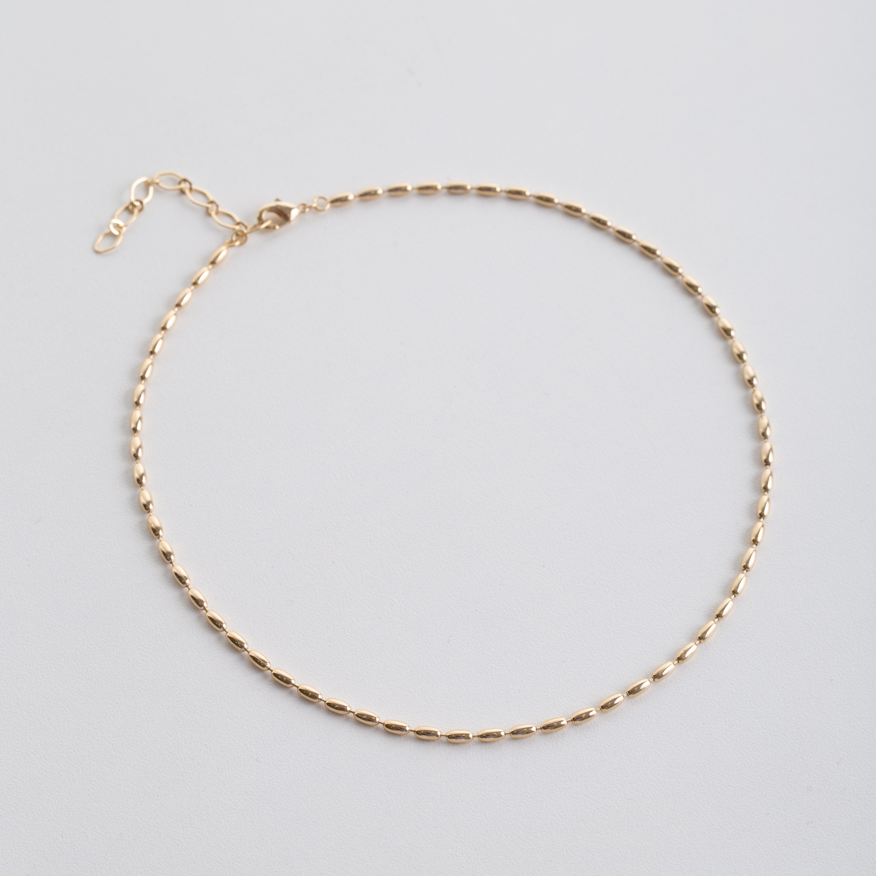 18657 Gold Oval Rice Bead Choker 14"