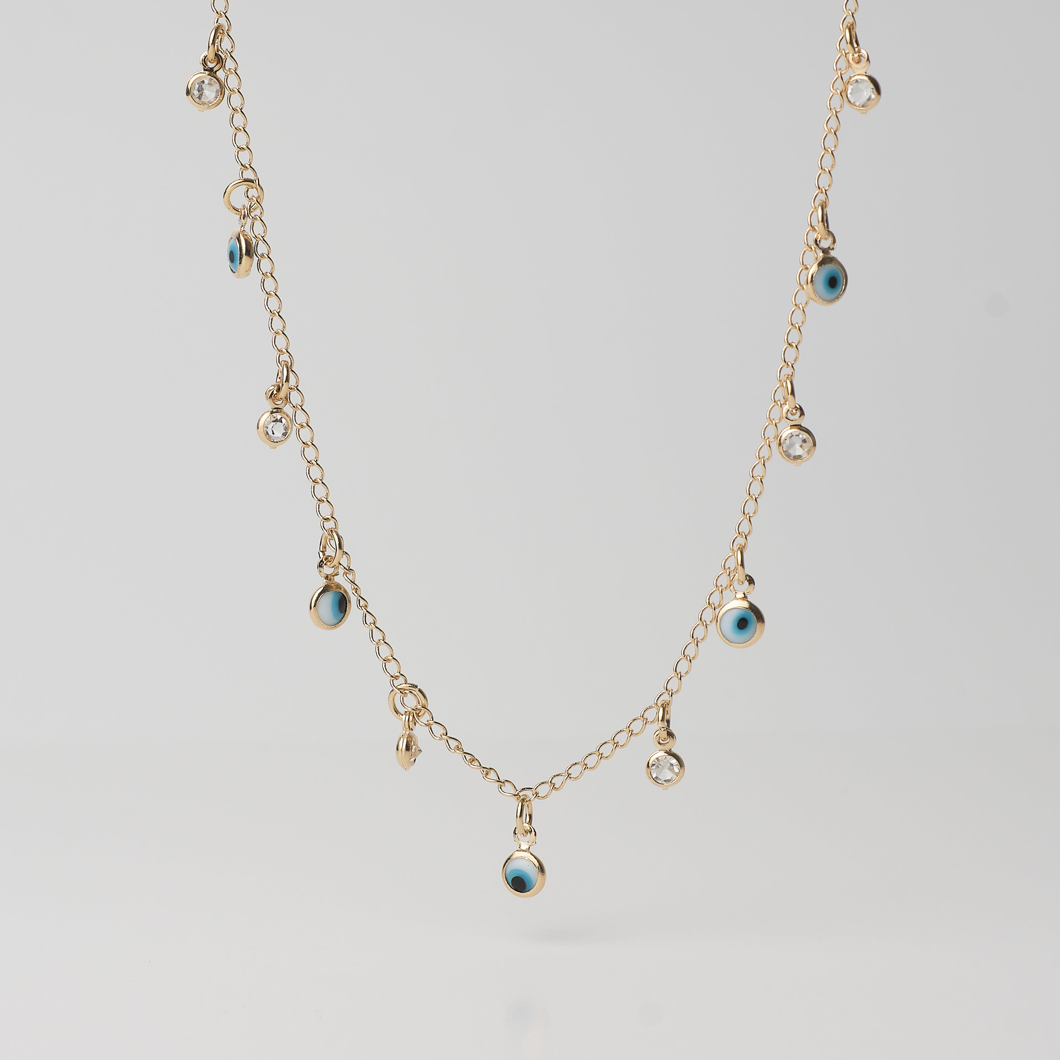 15593 Gold Chain with Evil Eye and Crystal Charms