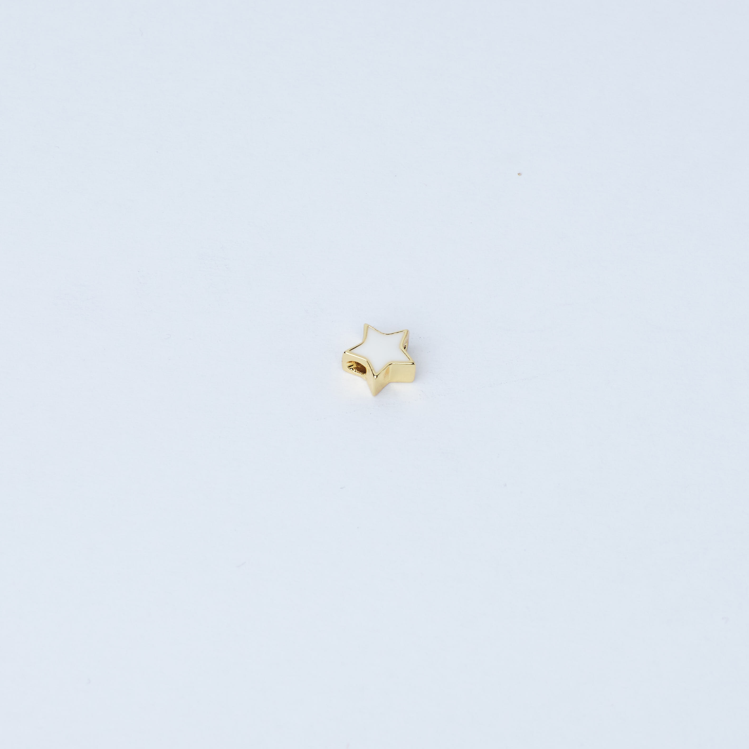 16722 White Enamel Star Spacer
