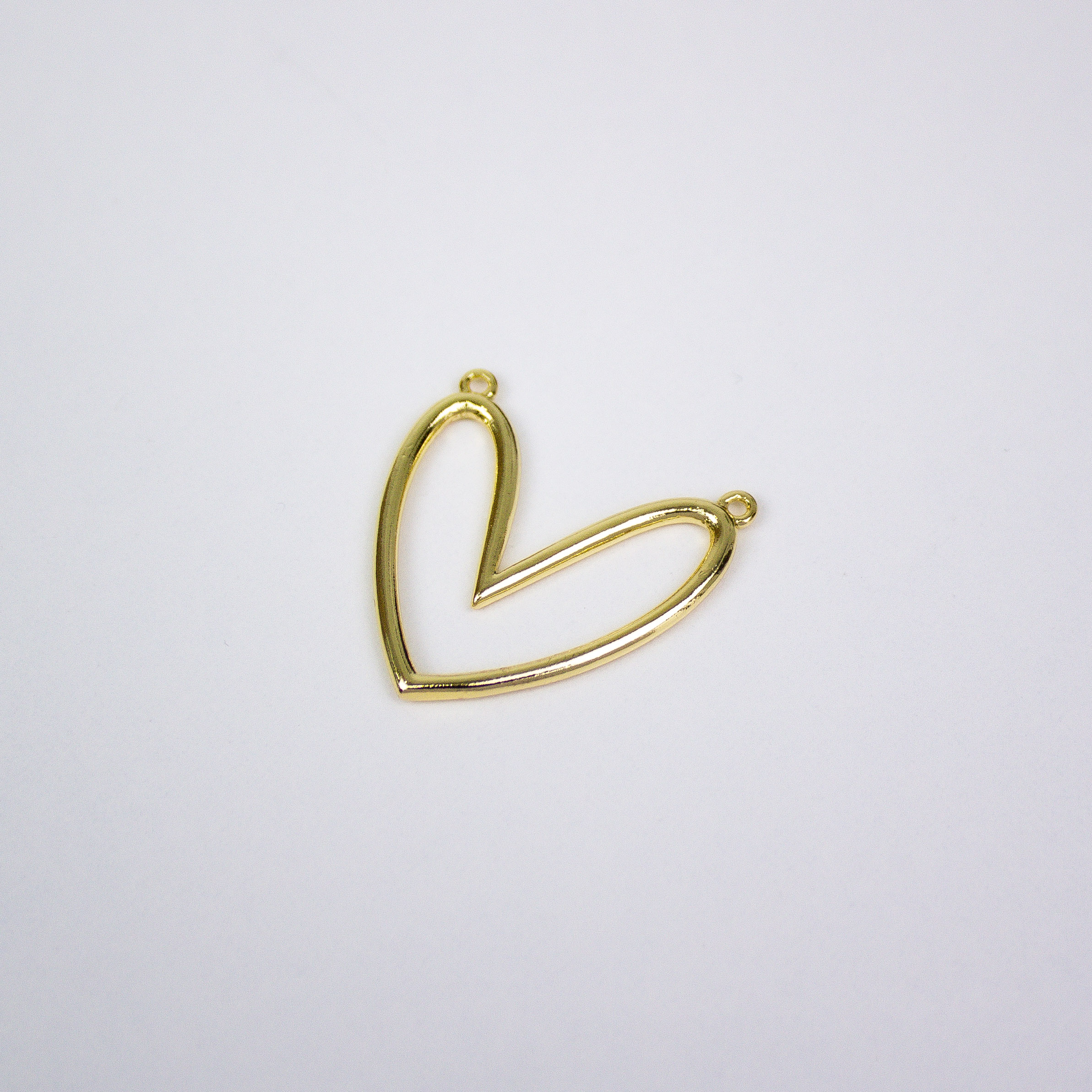 17334 Dije Corazón Dorado Doble Agujero