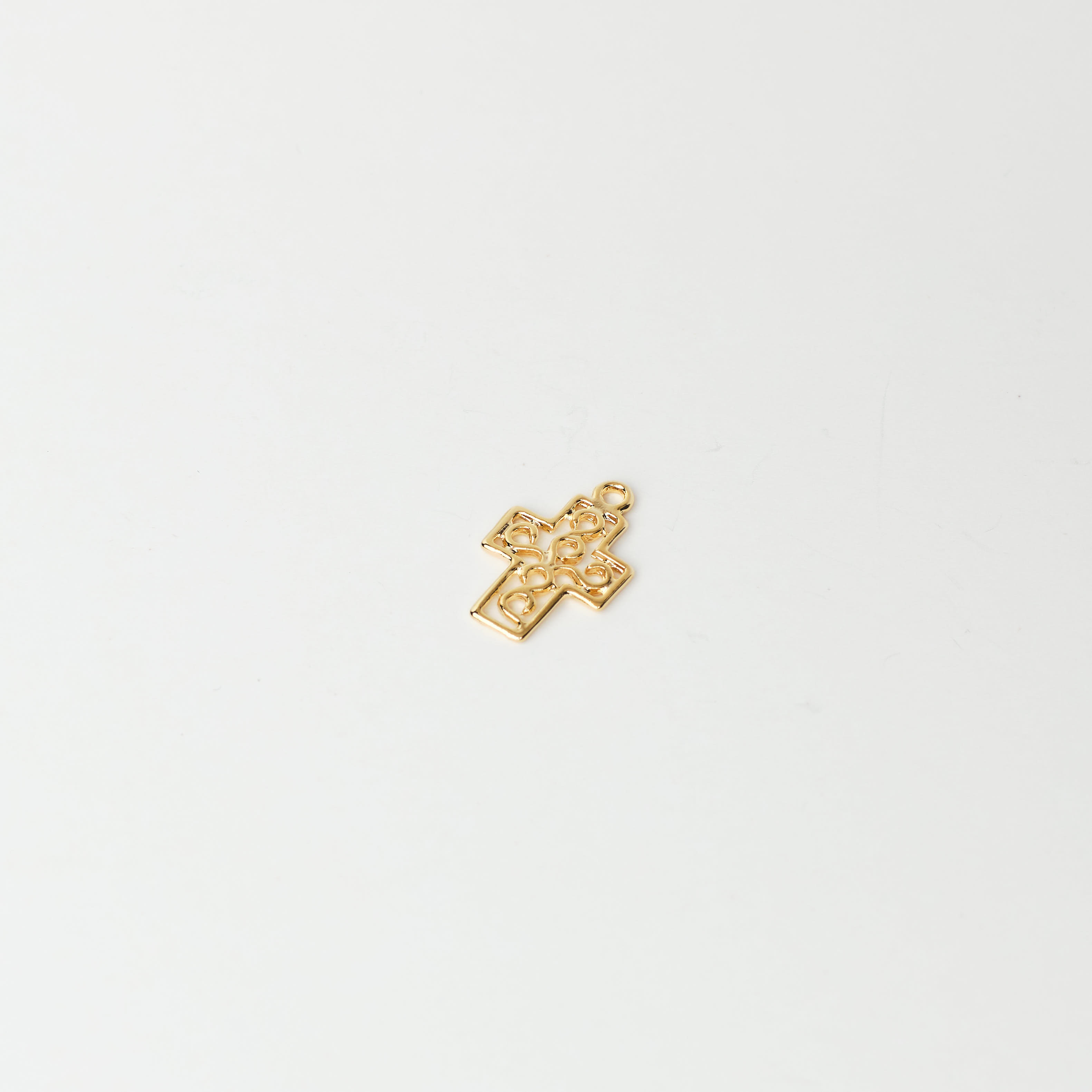 5769 Small Gold Plated Silhouette Cross Pendant